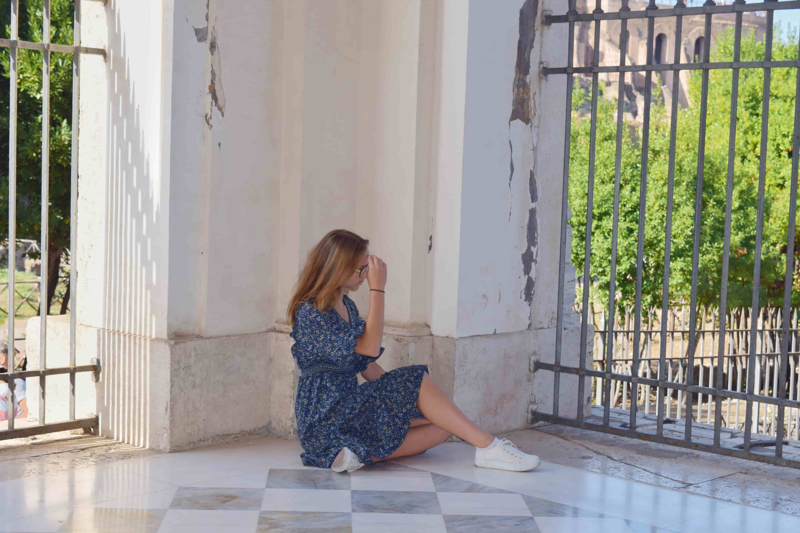 Student praying in Rome