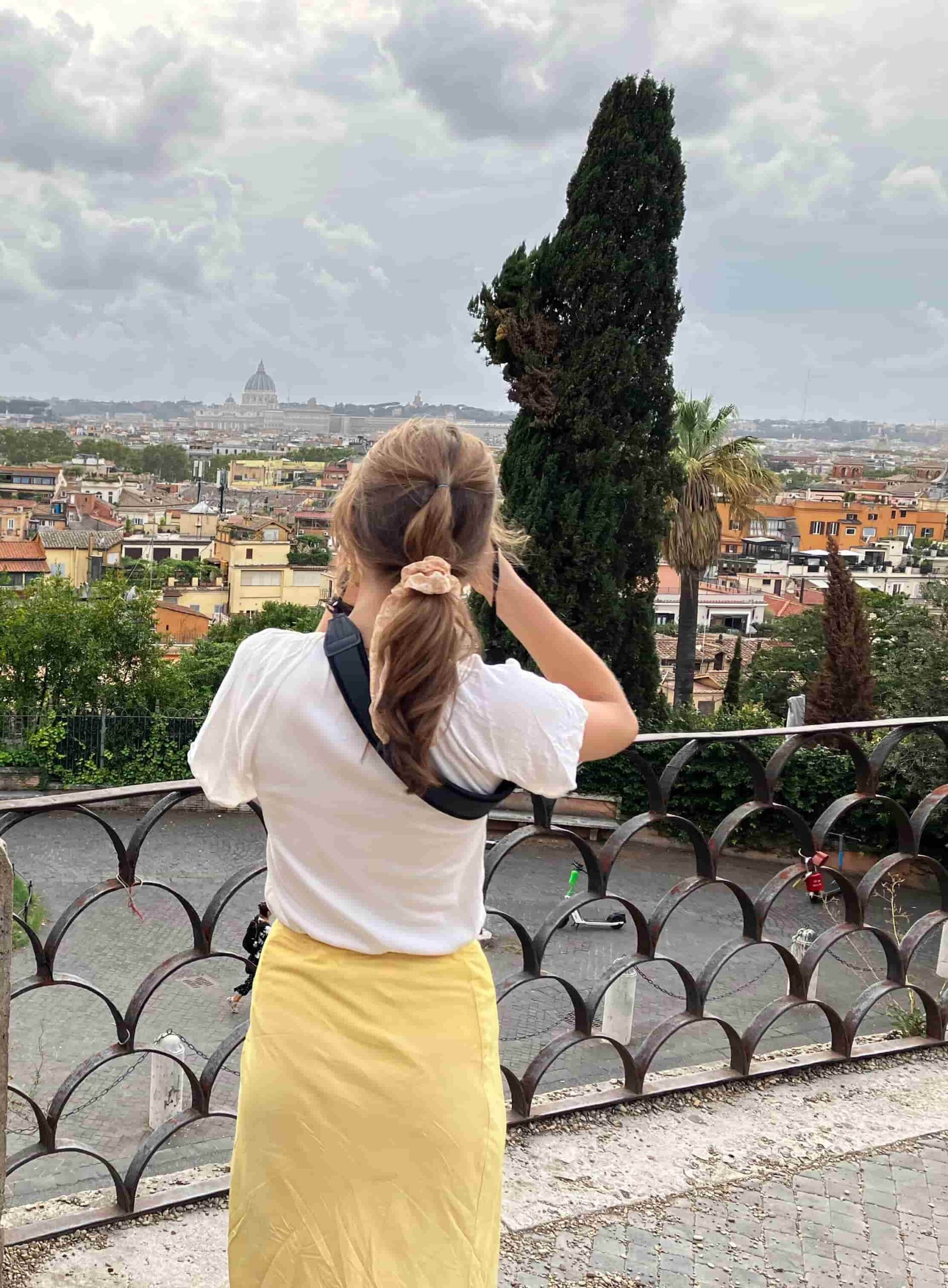 Student taking photo in Rome